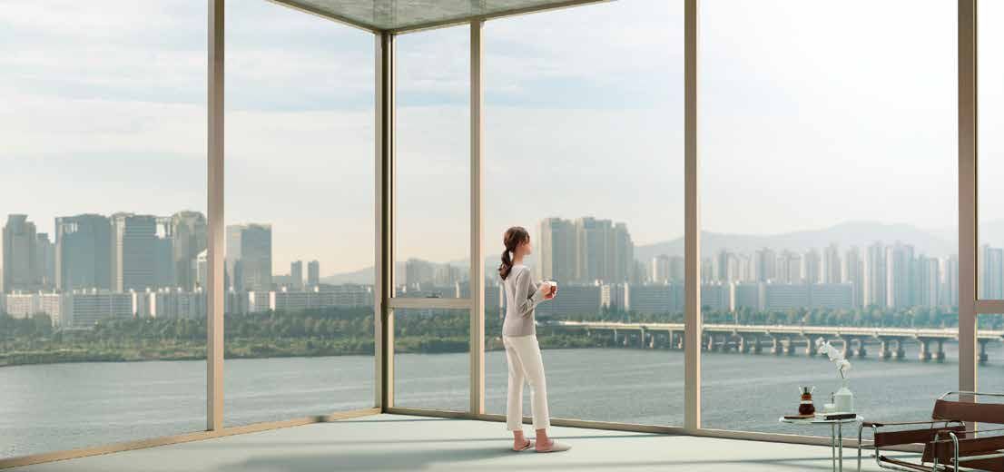 High-rise facade glazing with a city skyline view